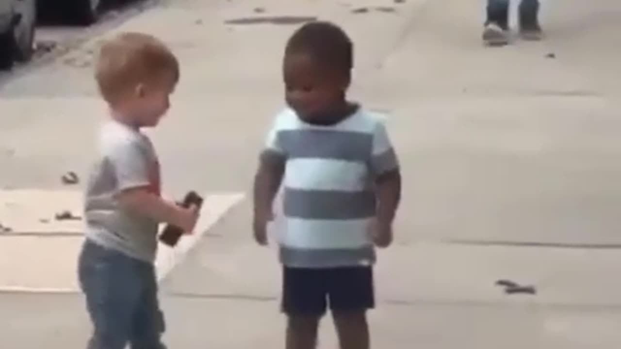 Sparks of Happiness: When Two Kids Cross Paths!