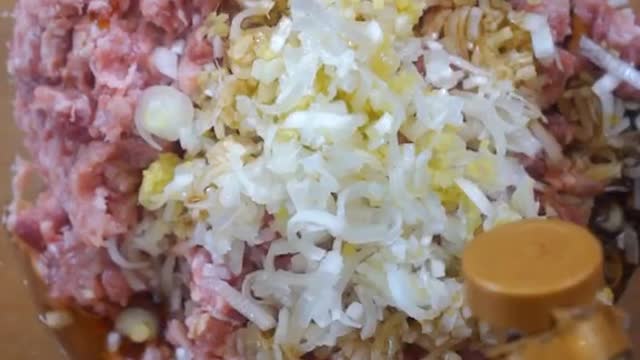 Dip in glutinous rice and steam it for tenderness and flavor