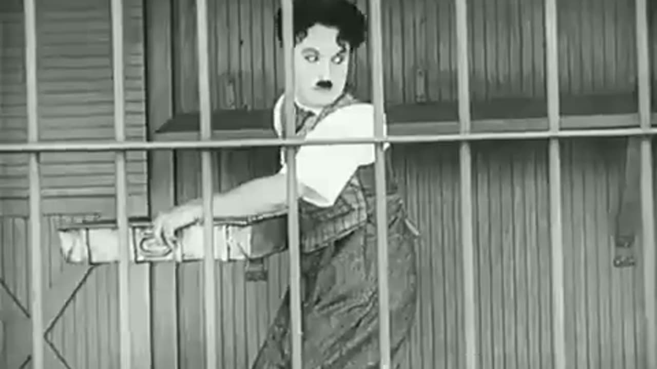 Charlie Chaplin - the lions cage