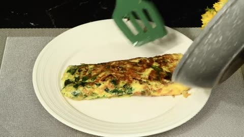 The perfect omelette with spinach. Easy and quick breakfast recipe.