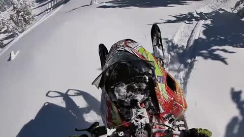 Guy Hit a Hidden Rock Riding His Sled Sending Him Over the Bars