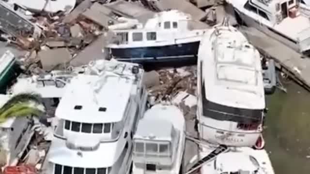 Drone footage shows piles of destroyed super yachts in the wake of Hurricane lan