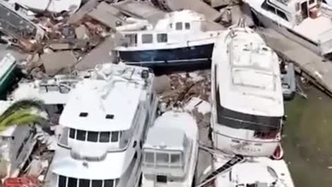Drone footage shows piles of destroyed super yachts in the wake of Hurricane lan