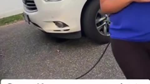 Entitled Karen Steals Electricity To Charge Her Tesla, But It's Ok Cuz Her Man