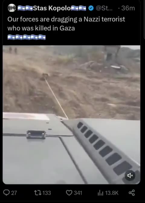 israeli terrorist dragging a dead Palestinian body by a rope
