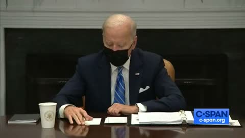 NEW - Biden has trouble reading the "booster" number off his paper.