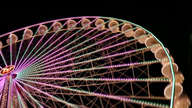 Colorful Ferris Wheel in Motion