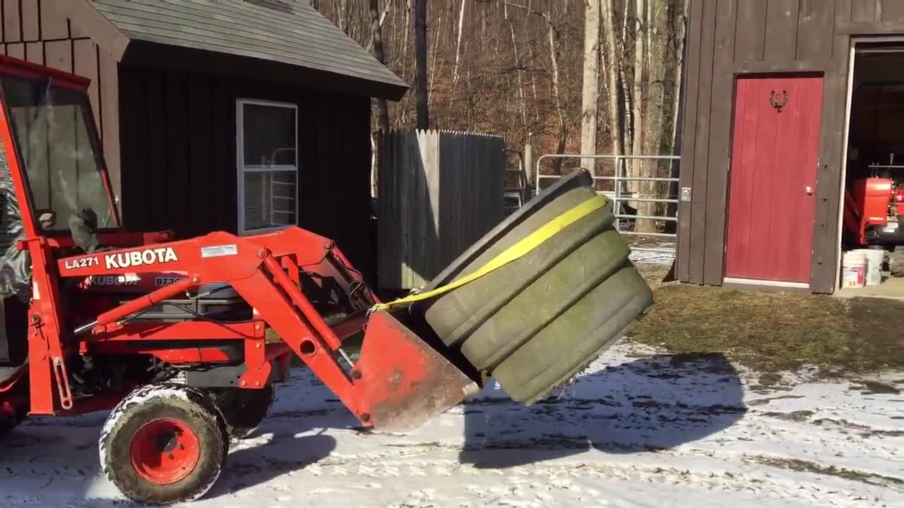 Daniel and the boys moving the old water tank. for grammie.