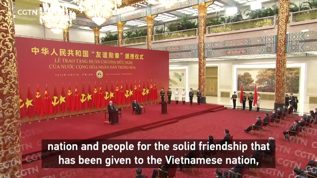 Xi presents China's Friendship Medal to Vietnam's communist party chief Nguyen Phu Trong