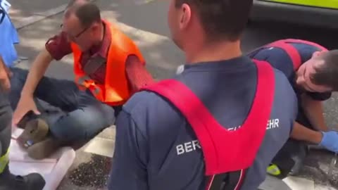 Anti-Oil Activist Glues Hand To Ground, Screams In Pain As Emergency Workers Try To Remove It