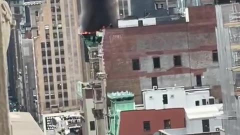 Massive fire spotted at roof of Soho Building in Manhattan, New York.