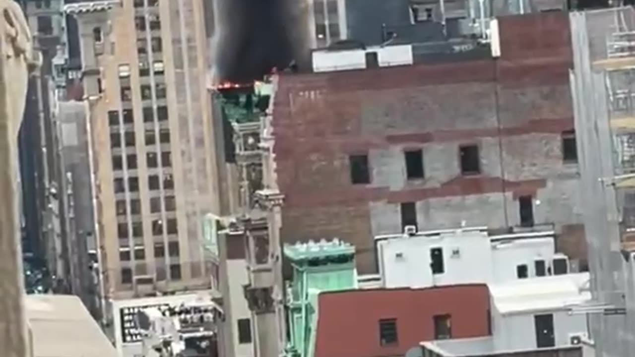 Massive fire spotted at roof of Soho Building in Manhattan, New York.