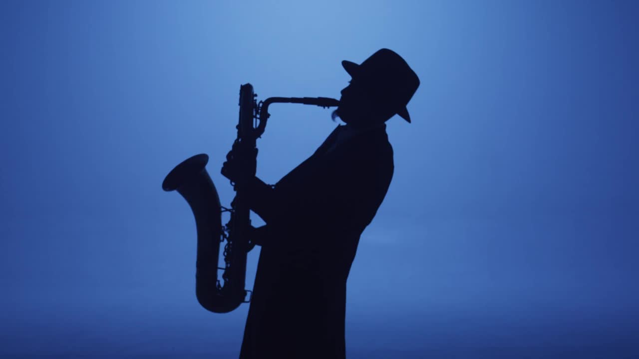 Shadow of a saxophonist playing inspired