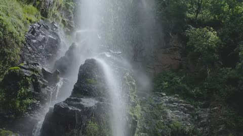 mixkit-waterfall-in-forest-2213-medium / waterfall video 2023 / discover pakistan