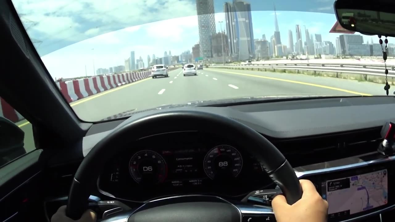 Luxury on Wheels: Driving Through Dubai's Opulent Districts and High-End Boutiques