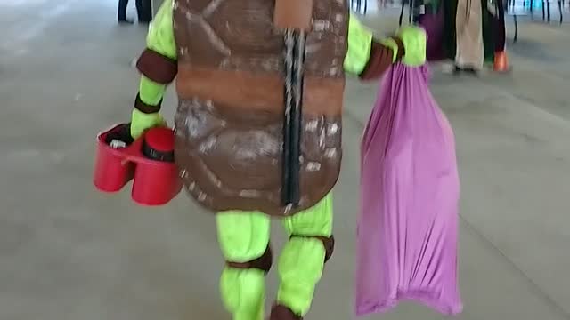 Ninja turtle arrives at the briar club for the Halloween party