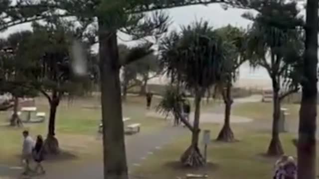 been spotted towing a boat with a mobility scooter through the main street of Coolangatta