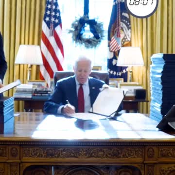 Biden Posts Gloating Video Signing 65 Bills