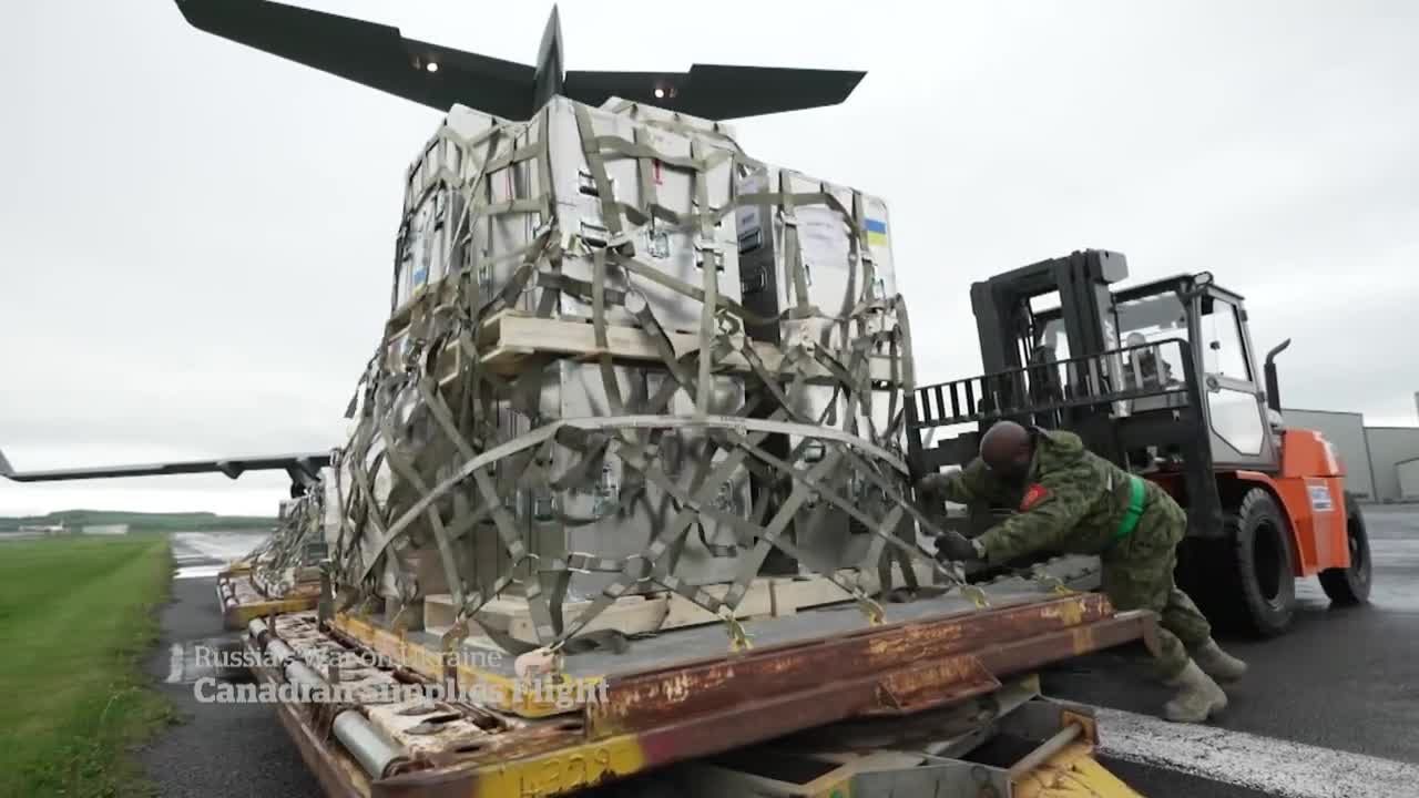 Aboard a Canadian Forces aircraft delivering aid to Ukraine