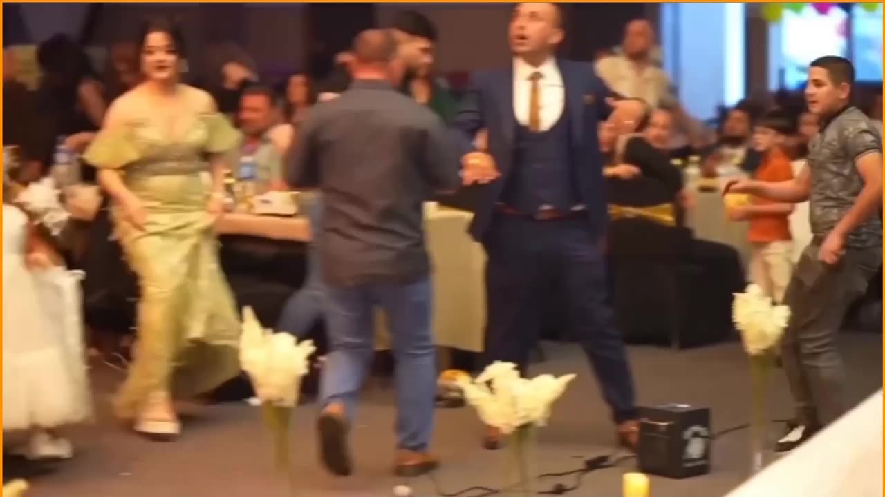 Video has emerged of a fire breaking out at a wedding in Iraq, killing more than 100 p1