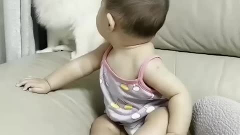 Cute baby and dog