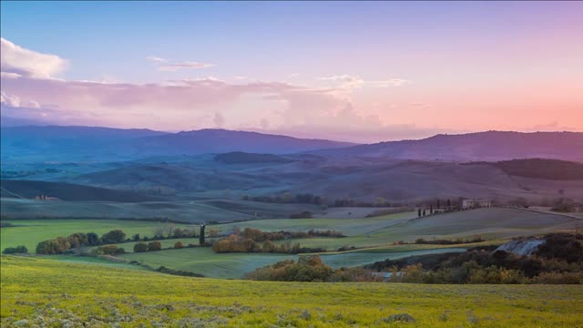 evening over the fields and hills of tuscany time lapse