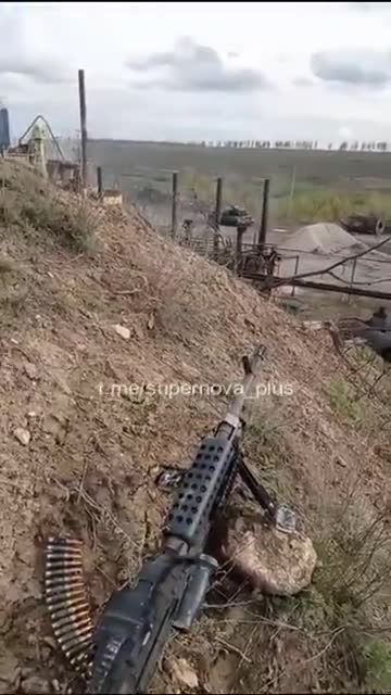 Ukrainian forces in a firefight with the support of a tank