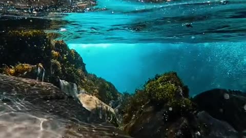 Hidden waterfall in Alaska and all the beautiful glacier water below