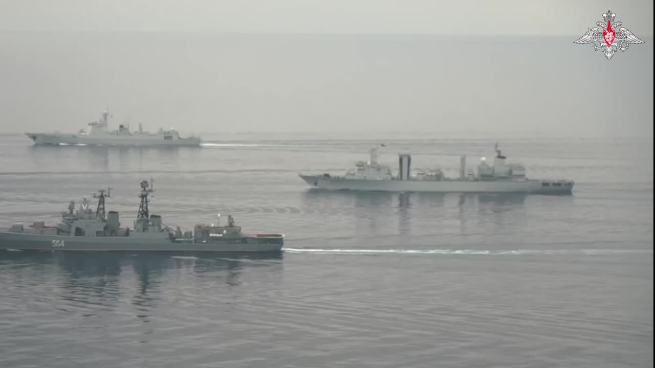 Ships of Russian Navy and Chinese Navy practise search and destruction of mock