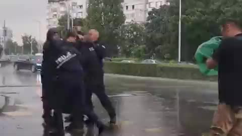 Priest trying to stop Zelensky in Sofia, Bulgaria.