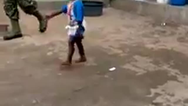 A child training to be a soldier