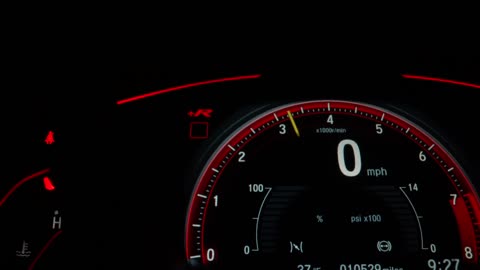 The car speedometer in the dark