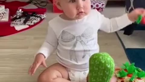 A Baby With Dancing Cactus