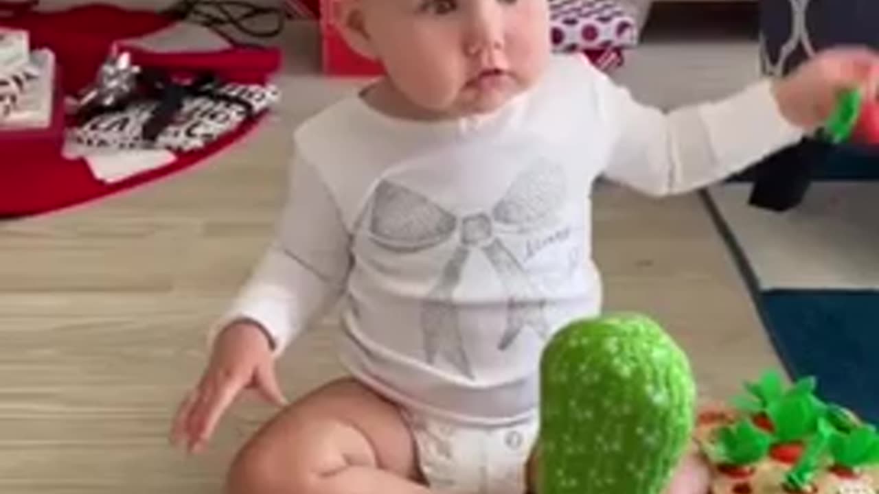 A Baby With Dancing Cactus