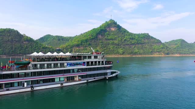 A ship surrounded by mountains