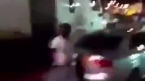 looting this FedEx truck until it tried to drive away while dragging someone