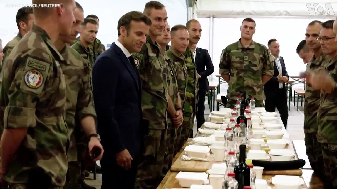 Macron Shares Meal with French, Belgian Troops in Romania