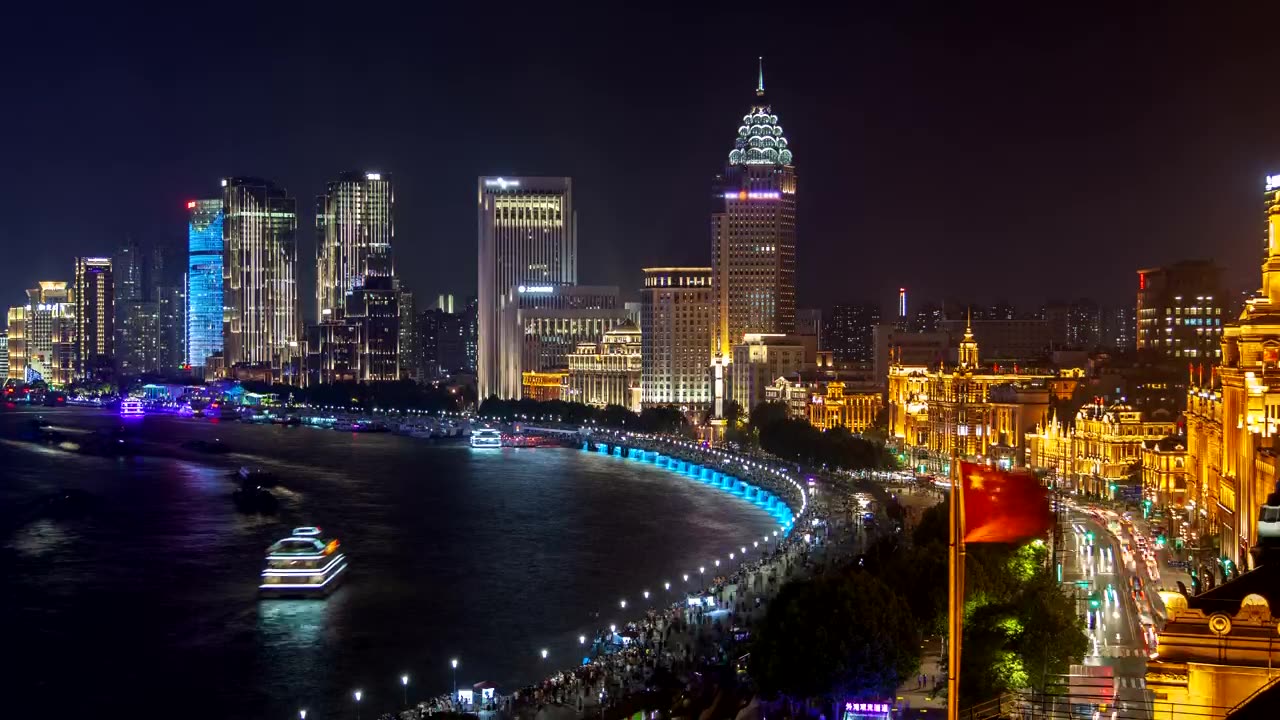 Shanghai river and city skyscrapers illuminated