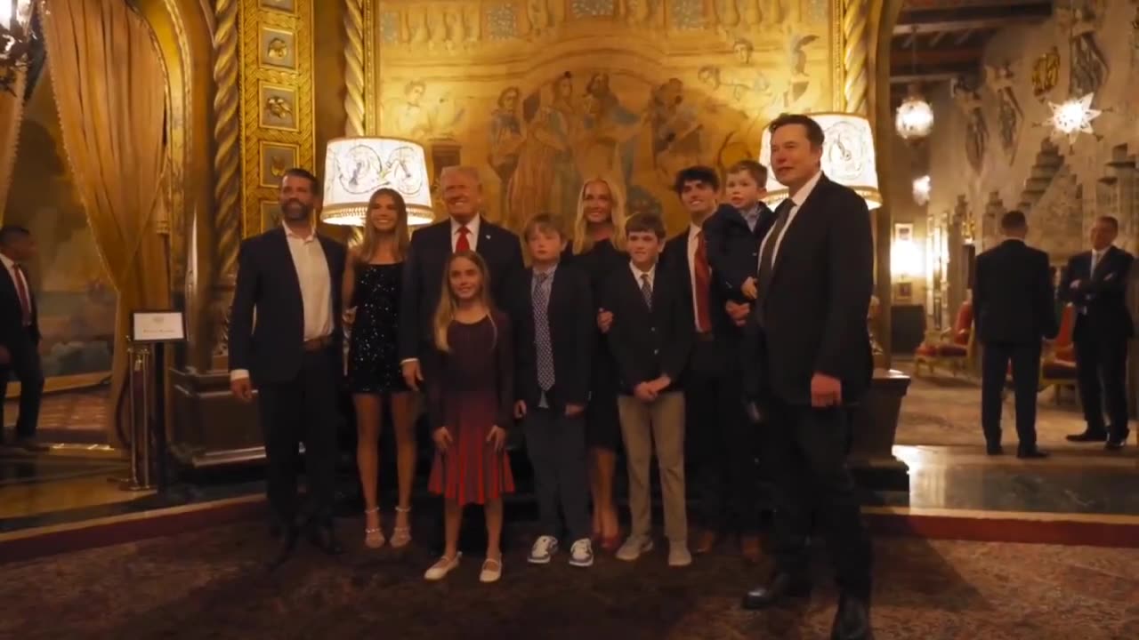 Trump requests that Elon Musk and his son join the family photo.