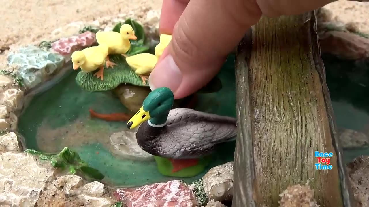 Farm Animal Toys In The Sandbox