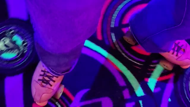 Practicing a spin at the roller rink on the carpet