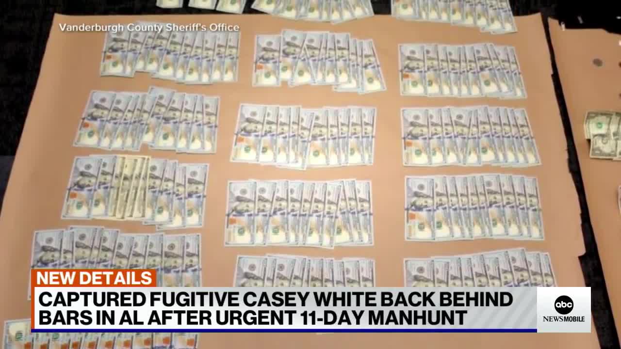 CAPTURED FUGITIVE CASEY WHITE BACK BEHIND
