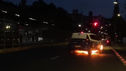Flaming Car Pulls Over