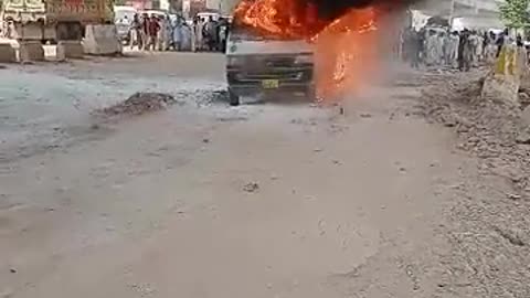 Car burning in pakistan