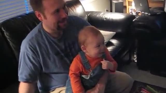 infant chuckling at the Wii