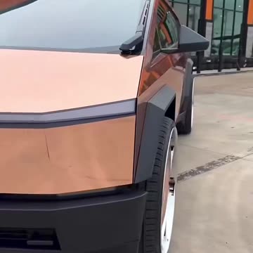 Somebody wrapped their Cybertruck in Mirror Rose Gold and put matching 30 inch dual tone wheels