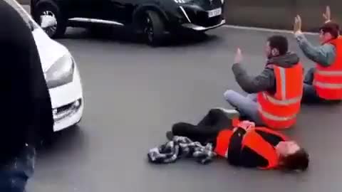 Angry French man throws climate protesters around like rag dolls