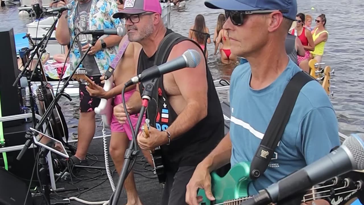 Hurry Up Wait band sings The Cars Magic at Shawano Lake Sand Bar Bash