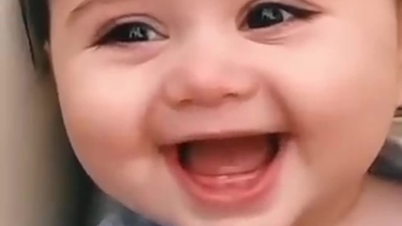 Cute baby laughing