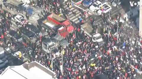 Anti-Vaccine Protesters Gather in Downtown Toronto